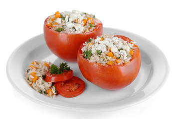 Stuffed tomatoes on plate isolated on white