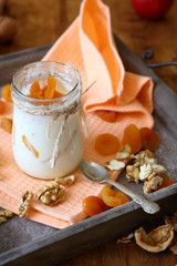 fresh yogurt with pieces of apricot