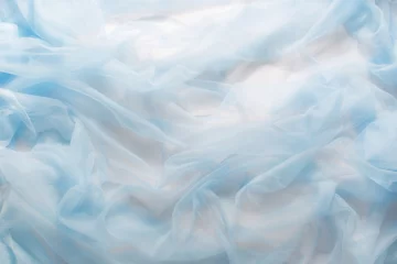 Foto op Plexiglas Stof Gladde elegante blauwe stof kan als achtergrond worden gebruikt