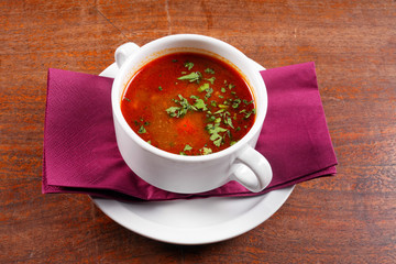 Delicious soup in white dish