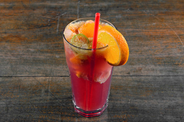 Refreshing lemonade on wooden table
