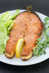 fried salmon with salad