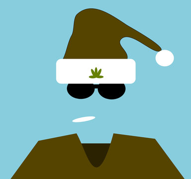 man smoking marijuana wearing stocking cap