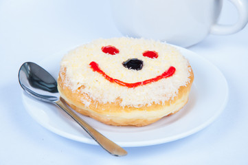 Sugar donut on dish on white background.