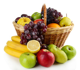 Composition of different fruits with basket isolated on white
