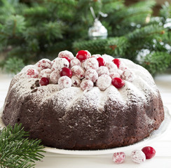 Chocolate cake with cranberries, new year, Christmas.