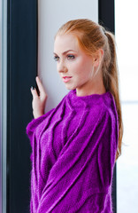 Fototapeta premium young beautiful woman in purple jersey