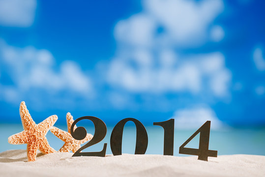 2014 letters with starfish, ocean , beach and seascape, shallow