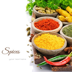 Colorful mix of spices isolated over white