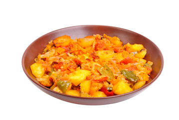 Vegetable ragout on bowl isolated on white background