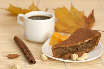 Fototapeta na wymiar Pumpkin pie served with a cup of coffee