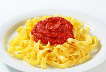 Tagliatelle pasta with tomato paste