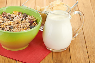 Delicious and healthy cereal in bowl with milk