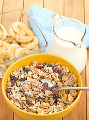 Delicious and healthy cereal in bowl with milk
