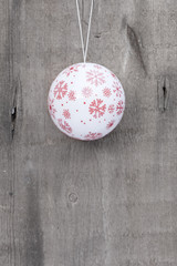 Generic machine made Christmas bauble ornament on rustic style b