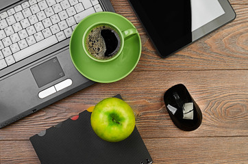 green apple on worplace