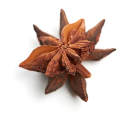 two whole star anise isolated on white background