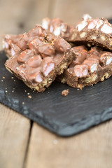 Rustic background with rocky road dessert squares