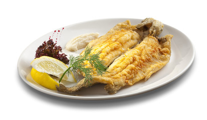 fired fish with limon on white background