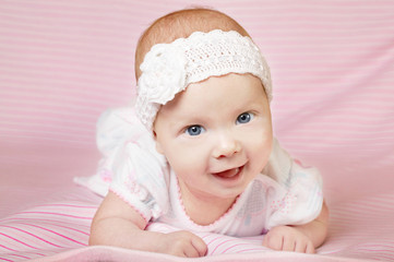Fototapeta na wymiar cute happy baby portrait with big eyes