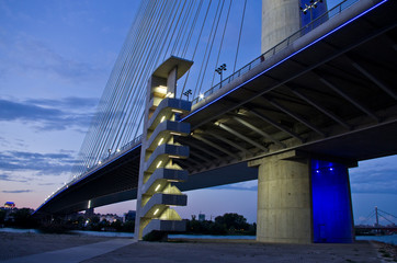 Fototapeta premium Cable bridge over Sava river at twilight