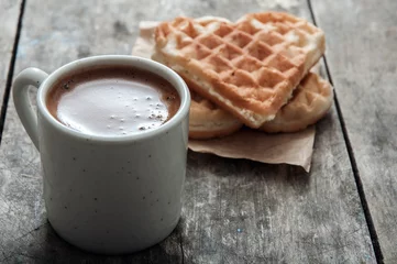 Foto op Plexiglas heart shaped waffles and coffee on table © librakv