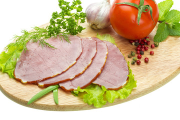 Ripe fresh ham with vegetables