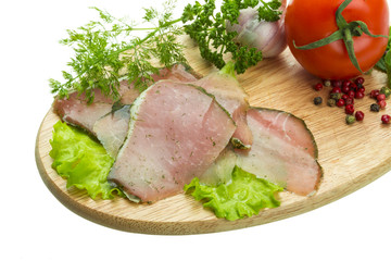 Ripe fresh ham with vegetables