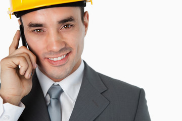 Close up of architect calling customer