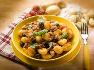 homemade gnocchi with ragout sauce, selective focus