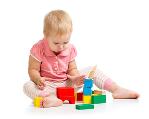 kid girl playing with wooden toys