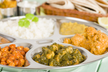 Thali - Vegetarian curries and rice in a traditional dish