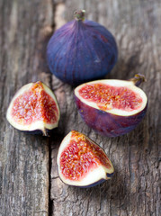 figs on wooden surface