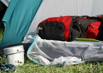 backpack in the tent and a aluminum lunchbox