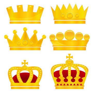 Set of gold crowns on white background
