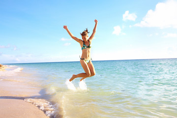 Fototapeta na wymiar Happy woman on Miami beach.