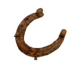 old rusty horseshoe isolated on white background