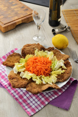 Cotoletta impanata con verdure