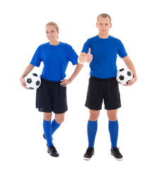 male and female soccer players in blue uniform with a balls on w