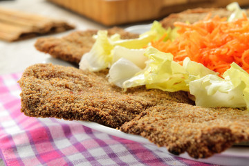 Cotoletta impanata con verdure