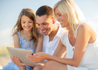 happy family with tablet pc taking picture