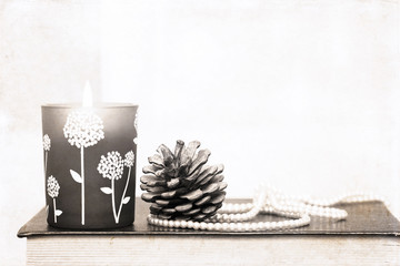 artwork in retro style, burning candle and decoration