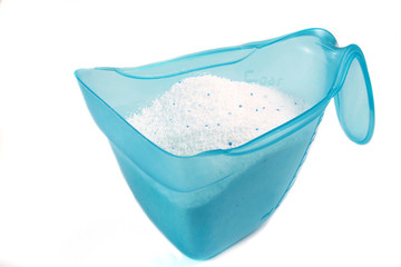 Laundry detergent or washing powder on white background