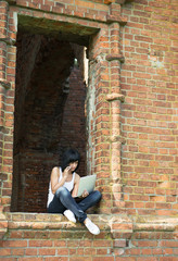 Young woman with a laptop