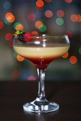 Tasty  blackberry cocktail on bright background