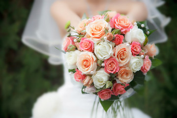 Bride with flowers outdoors