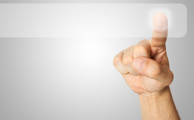 Finger pressing a button