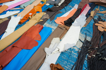 Multicolored leather scraps on a market stall