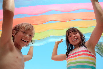 Children with inflatable mattress