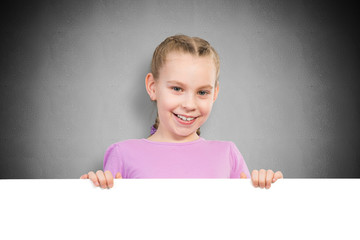 girl holding a white banner